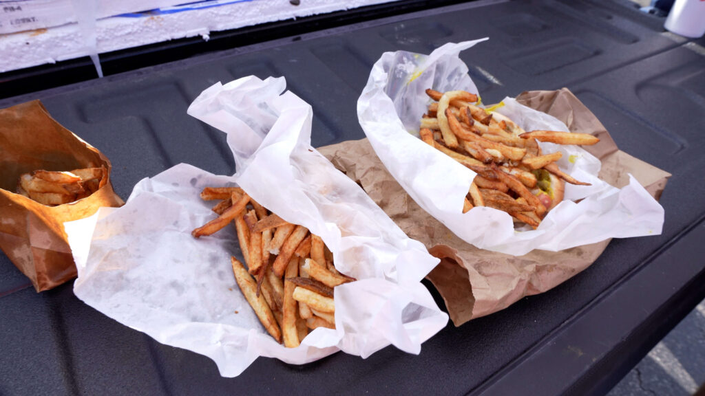 Classic Gene and Jude’s hot dog topped with fresh-cut fries featured in our Gene and Jude’s Chicago Fry Review.
