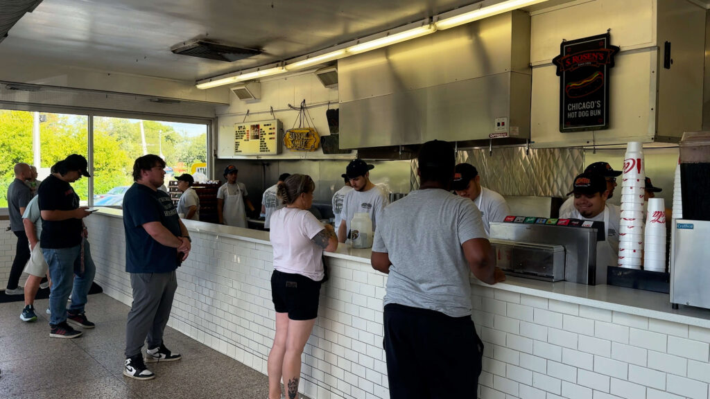 Customers ordering at the classic counter inside Gene and Jude’s during our Gene and Jude’s Chicago Fry Review.